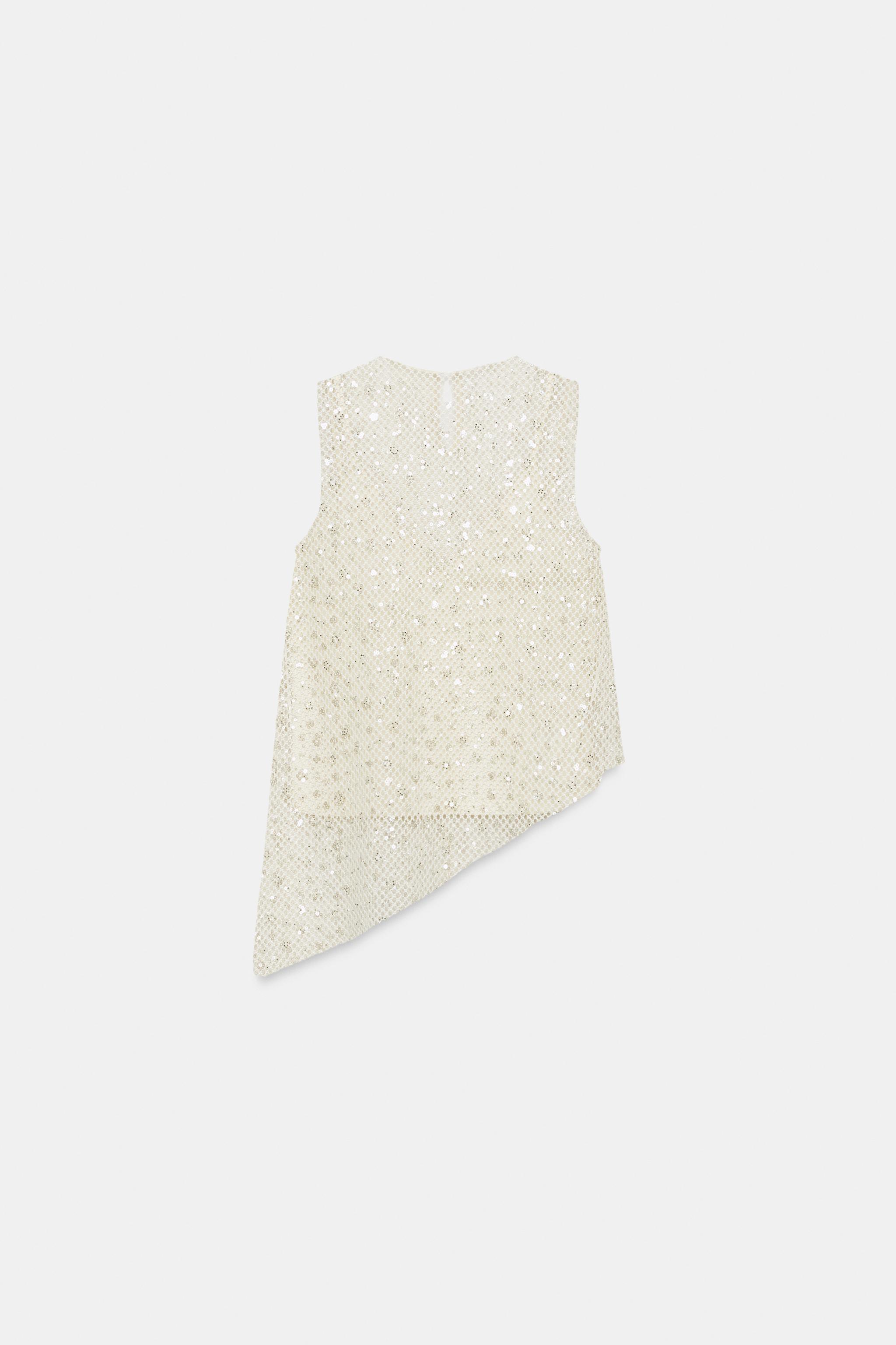 TOP RÉSILLE À PAILLETTES